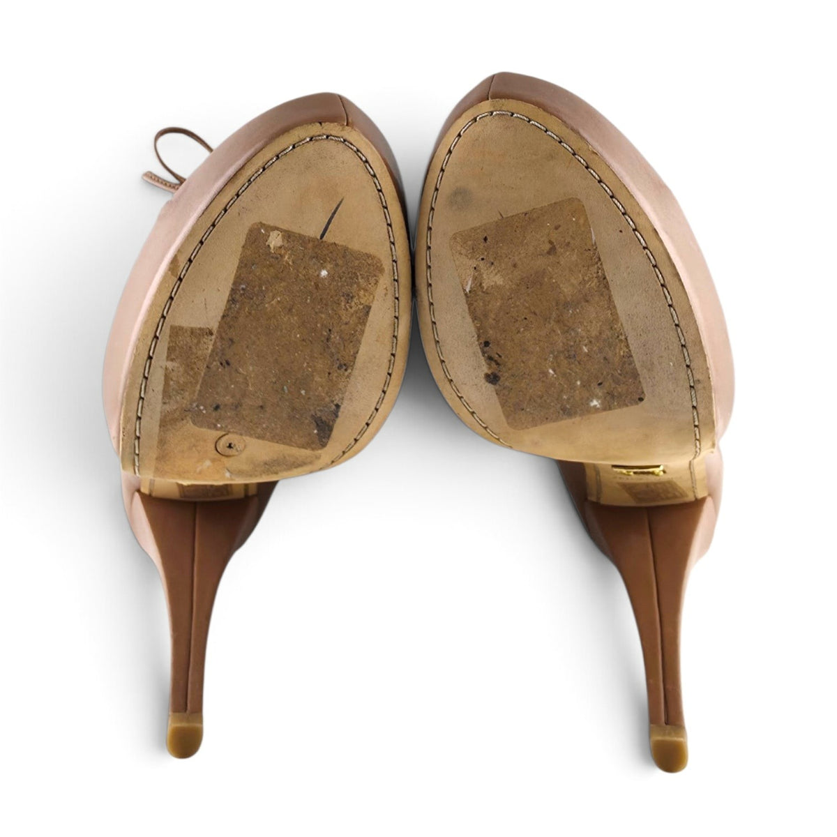 FuzzBeez Alejandro Ingelmo tan leather stiletto platform booties showing the worn leather outsoles from below