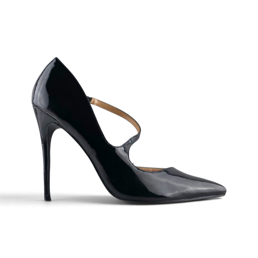 FuzzBeez black patent faux leather pointed toe stiletto pumps with an asymmetrical strap and high-gloss finish.