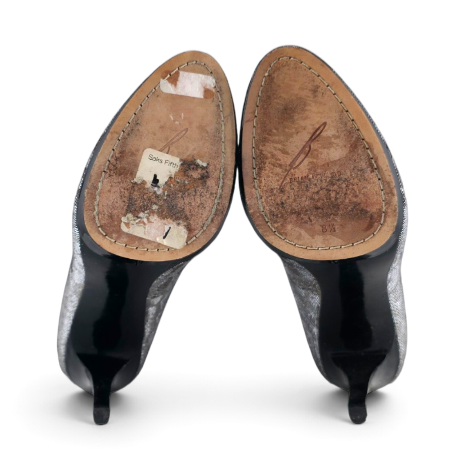 FuzzBeez Brian Atwood metallic leopard print platform pump soles showing leather construction and size 8.5 branding.