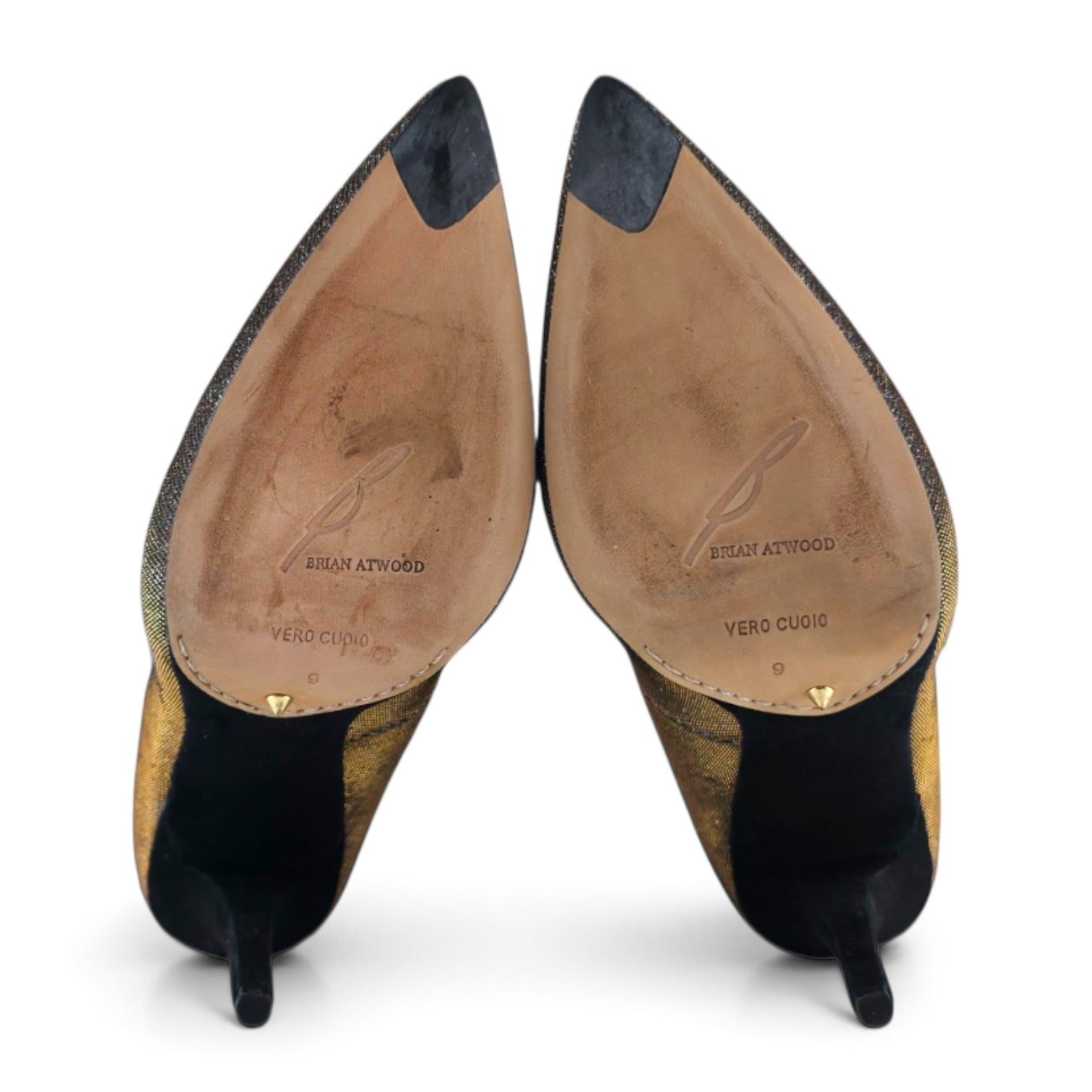 FuzzBeez Brian Atwood metallic gold and black stiletto pumps showing the genuine leather soles and pointed toes