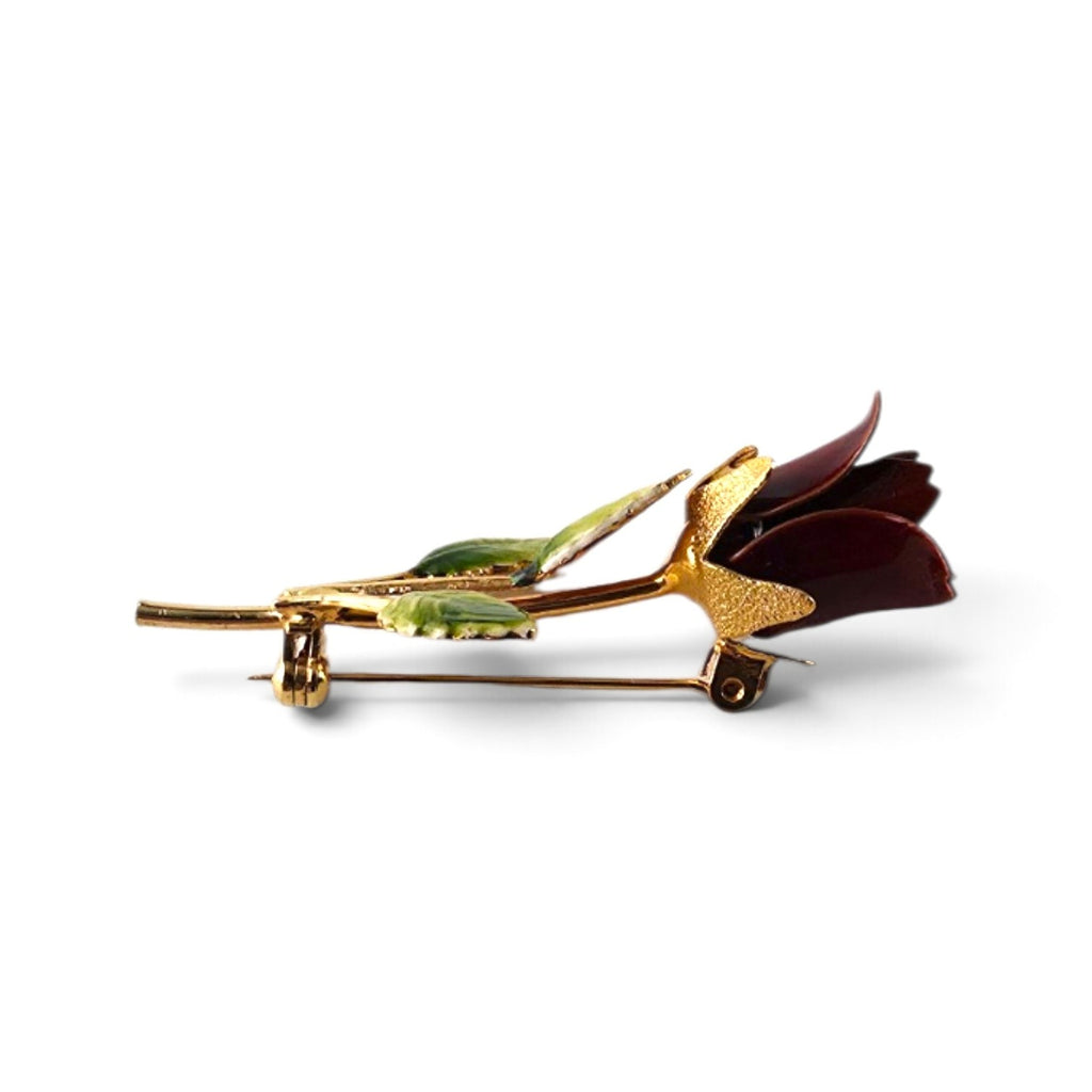 FuzzBeez vintage burgundy enamel rose brooch with a gold-tone stem and green leaves, featuring a rollover safety clasp.