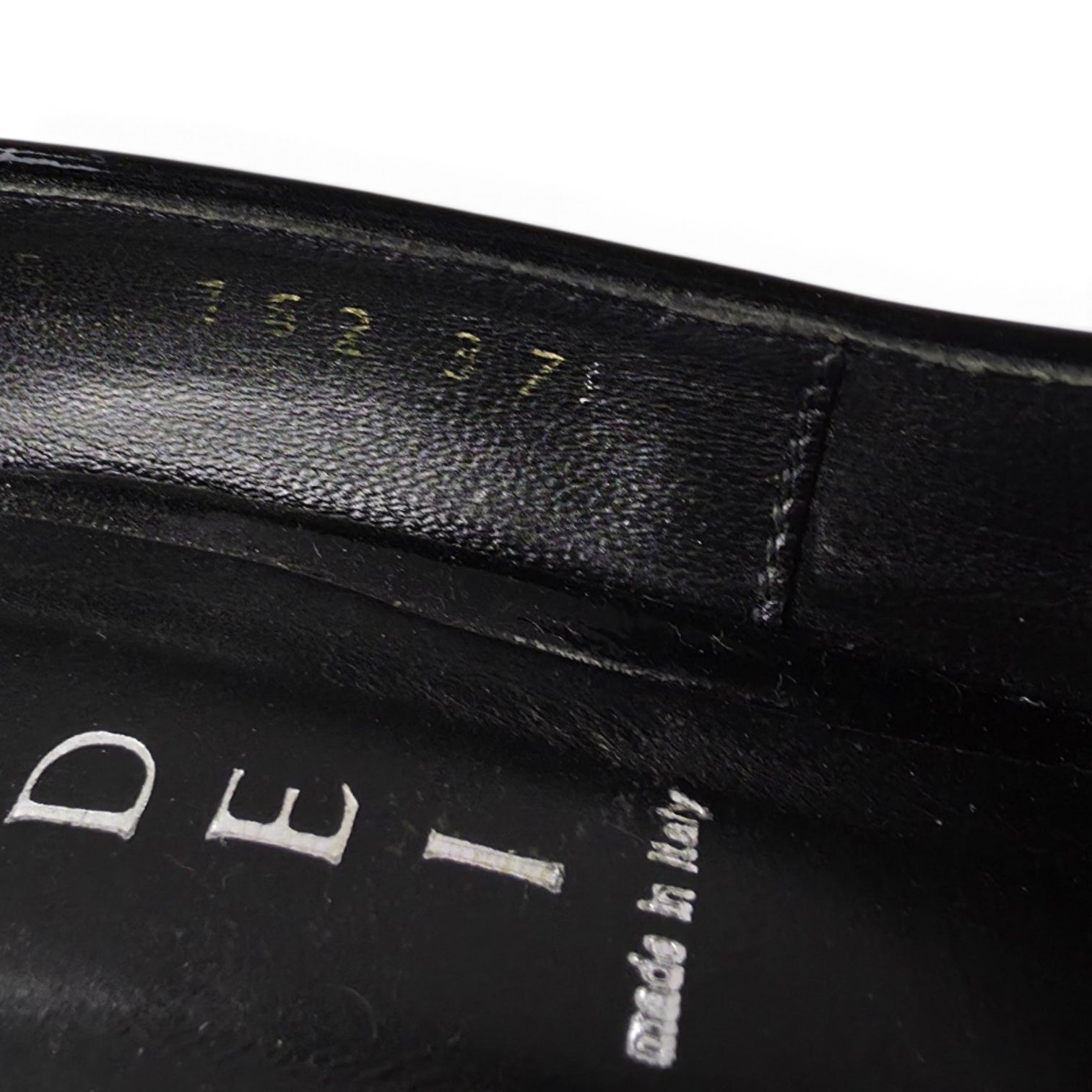 FuzzBeez Casadei black patent leather stiletto pump interior showing size 37.5 stamp and made in Italy branding
