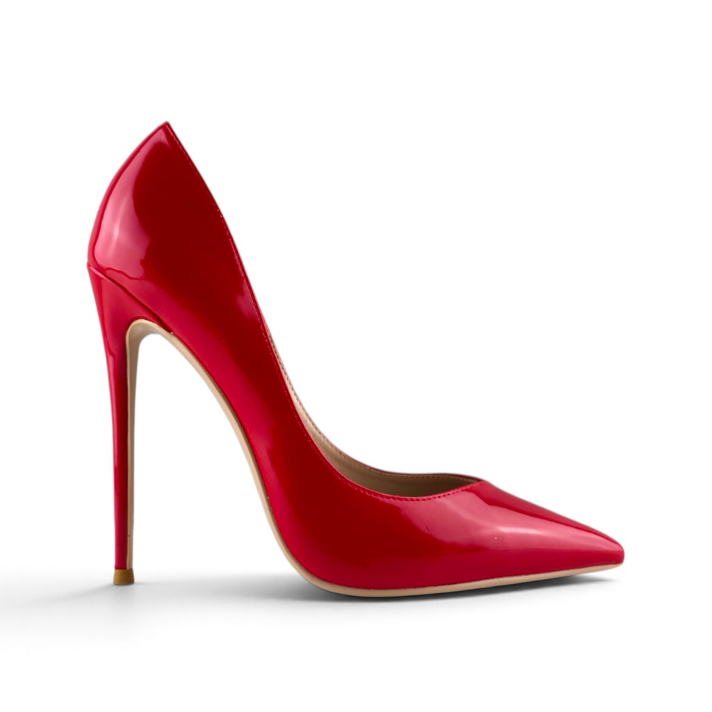 FuzzBeez cherry red patent vegan leather stiletto pumps with a 5-inch heel and pointed toe in a side profile view.