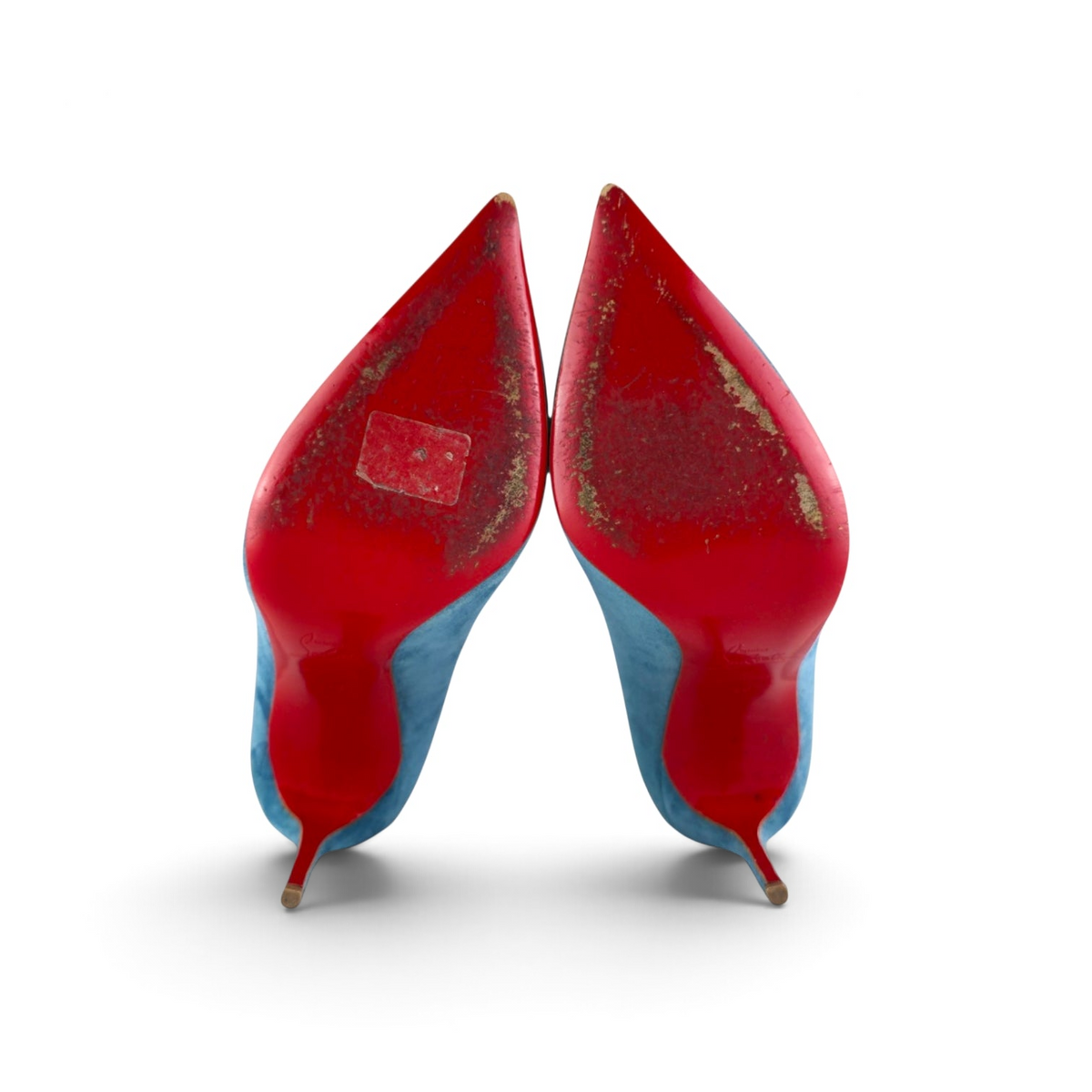 FuzzBeez Christian Louboutin Pigalle Follies 100 celeste blue suede pumps showing signature red lacquered leather soles