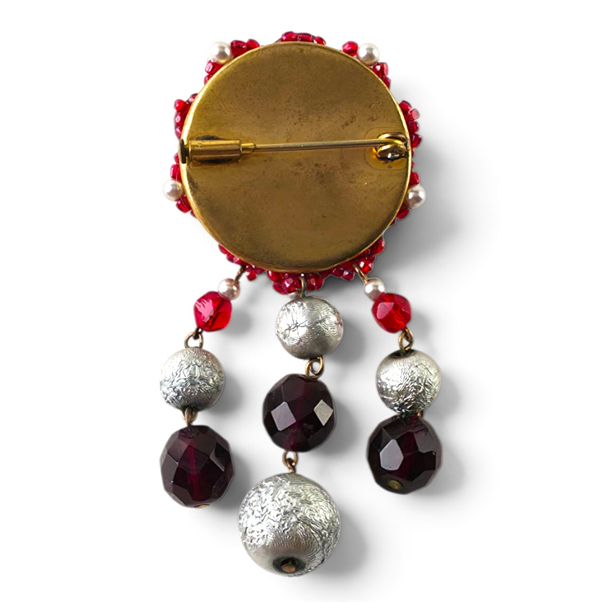 FuzzBeez vintage crimson red and silver bead dangle brooch showing the gold-tone metal backing and safety clasp.
