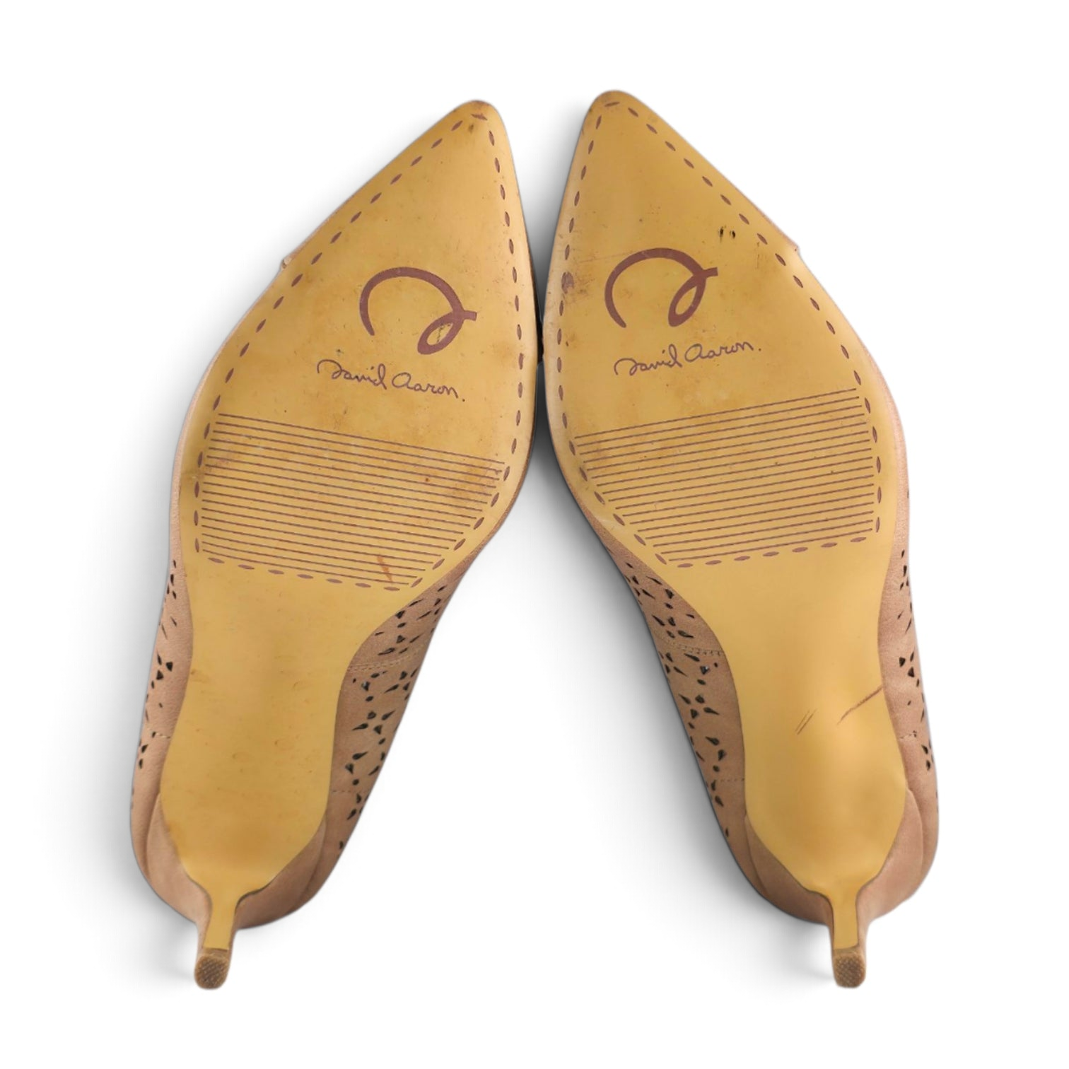 FuzzBeez David Aaron nude beige pointed toe stiletto heels showing the textured rubber soles with brand logo