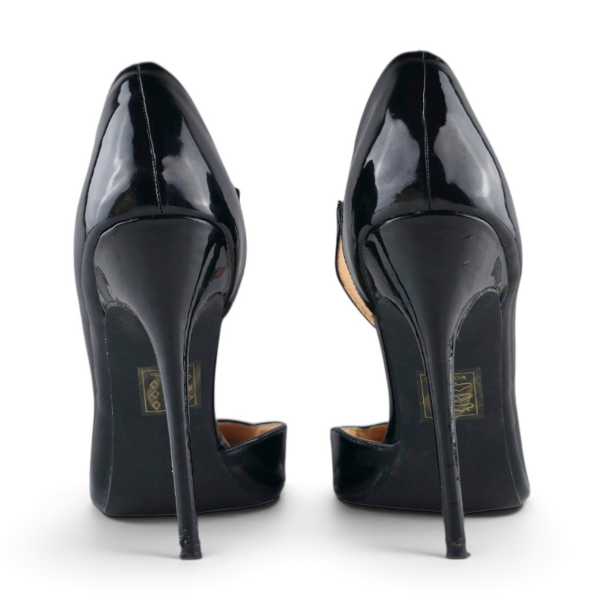 FuzzBeez Fashion Nova black patent faux leather stiletto pumps with asymmetrical strap and pointed toe, back view
