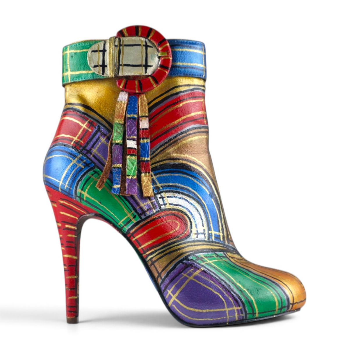 FuzzBeez hand-painted leather stiletto ankle boots featuring a vibrant multi-color tartan plaid pattern and side buckle.