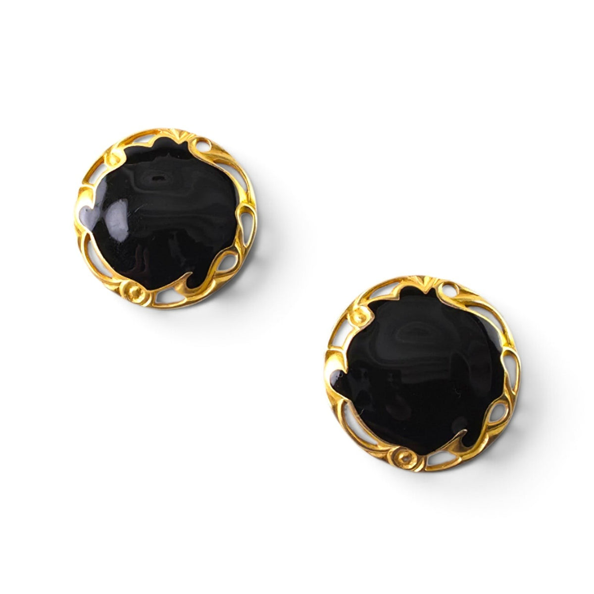 FuzzBeez vintage LIA round clip-on earrings featuring glossy black enamel centers and ornate gold-tone metal frames.