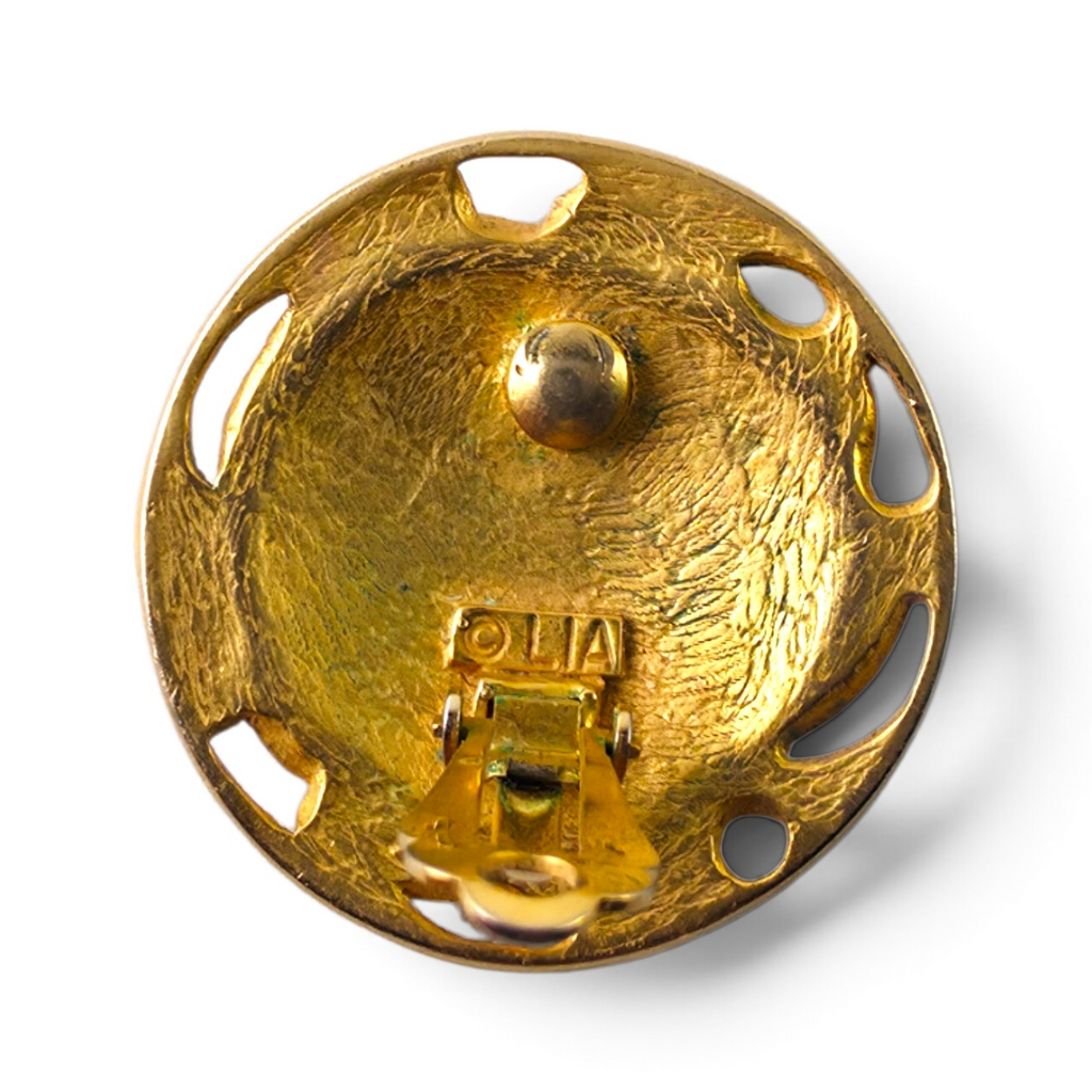FuzzBeez vintage LIA signed gold-tone clip-on earring back showing the hallmark and textured metal finish