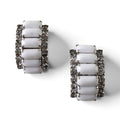 FuzzBeez vintage J-hoop clip-on earrings featuring white milk glass cabochons and clear rhinestones in silvertone settings.