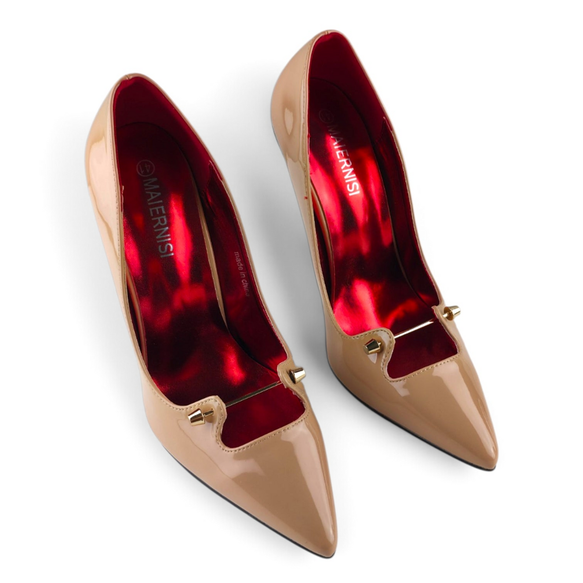 FuzzBeez MAIERNISI nude patent pointed-toe stiletto pumps with metallic red interior and gold-tone hardware accents.