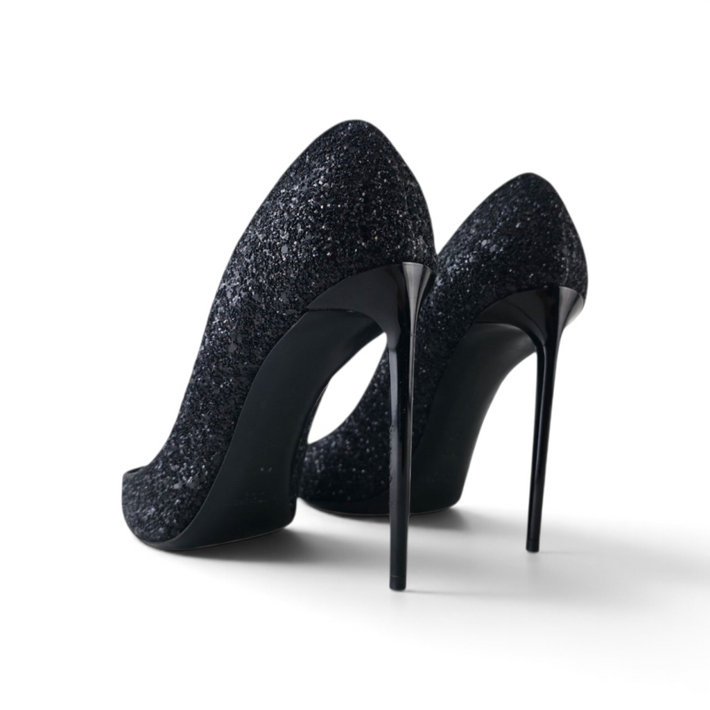 FuzzBeez Saint Laurent black glitter stiletto pumps with high-gloss heels shown from the back