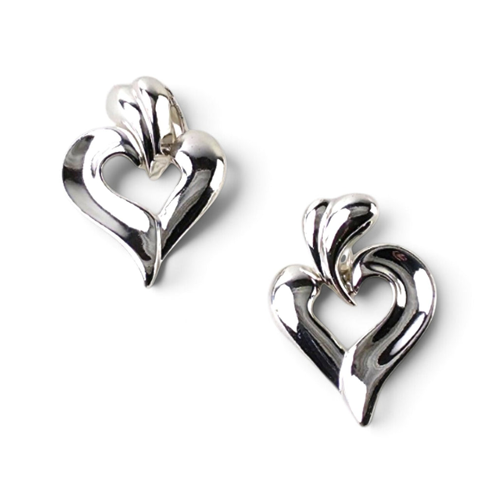 FuzzBeez vintage silver-tone modernist open heart dangle clip-on earrings with a polished abstract metal finish.