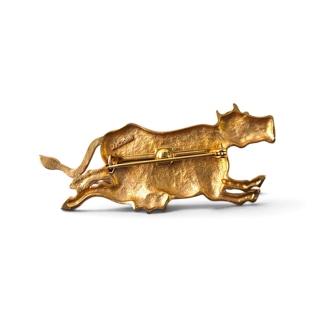 FuzzBeez vintage 1988 JJ matte gold-tone running cow brooch pin showing the back with locking bar clasp