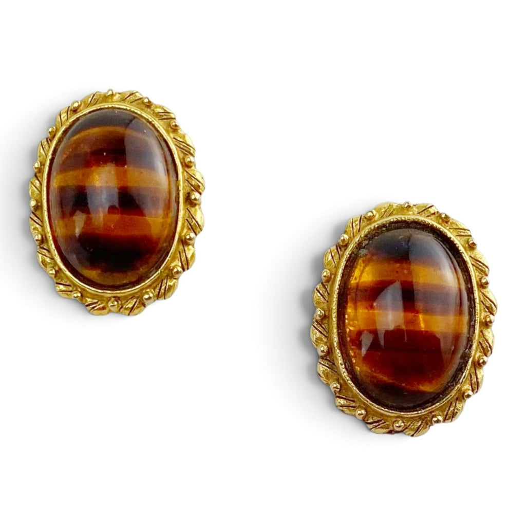 FuzzBeez vintage oval clip-on earrings featuring amber and brown faux tiger's eye cabochons in gold-tone metal frames.