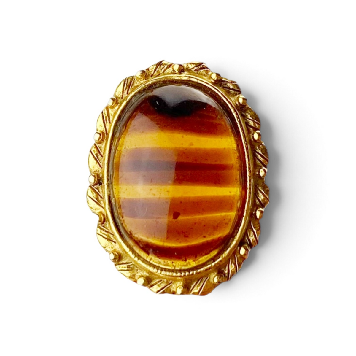 FuzzBeez vintage oval clip-on earrings featuring a gold-tone metal frame and amber faux tiger's eye cabochon stone.